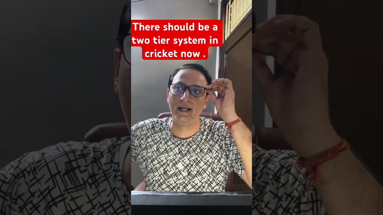 There should be a two tier system in cricket now .