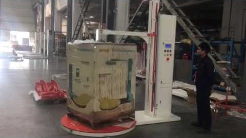 Semi automatic pallet wrapper with top press plate