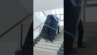 Move A Big And Heavy Sofa Upstairs By An Electric Stair Climber.