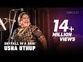 Usha uthup skyfall in a sari