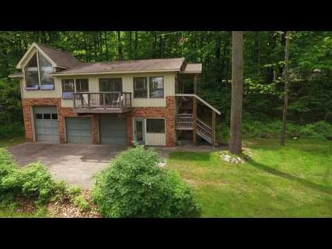 9253 SW Torch Lake Dr, Rapid City, MI home video tour