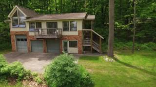 9253 SW Torch Lake Dr, Rapid City, MI - Branded
