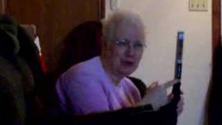 Grandma opens Christmas gift from Susie 12/25/2005