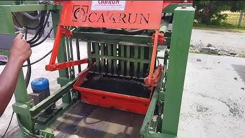 caarun Auto feeder plc type concrete block making machine.. phone 9360321525