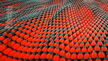 Animation of abstract wave red metallic liquid with reflections. Loopable animation.