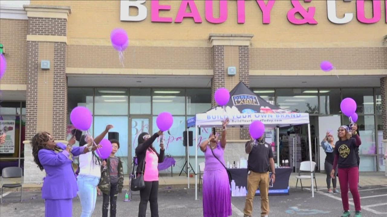 Domestic violence awareness event held to comfort victims - YouTube