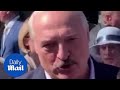 Belarus president alexander lukashenko threatens protester during factory visit in minsk