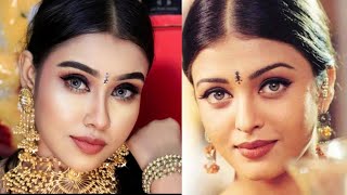 Aishwarya Rai mushuk bilan yalangoch Aishwarya Rai mushuk bilan yalangoch