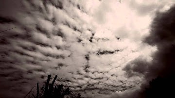 Cool sepia multi-layer cumulus passing in timelapse Canon 5D Mk2 V08906