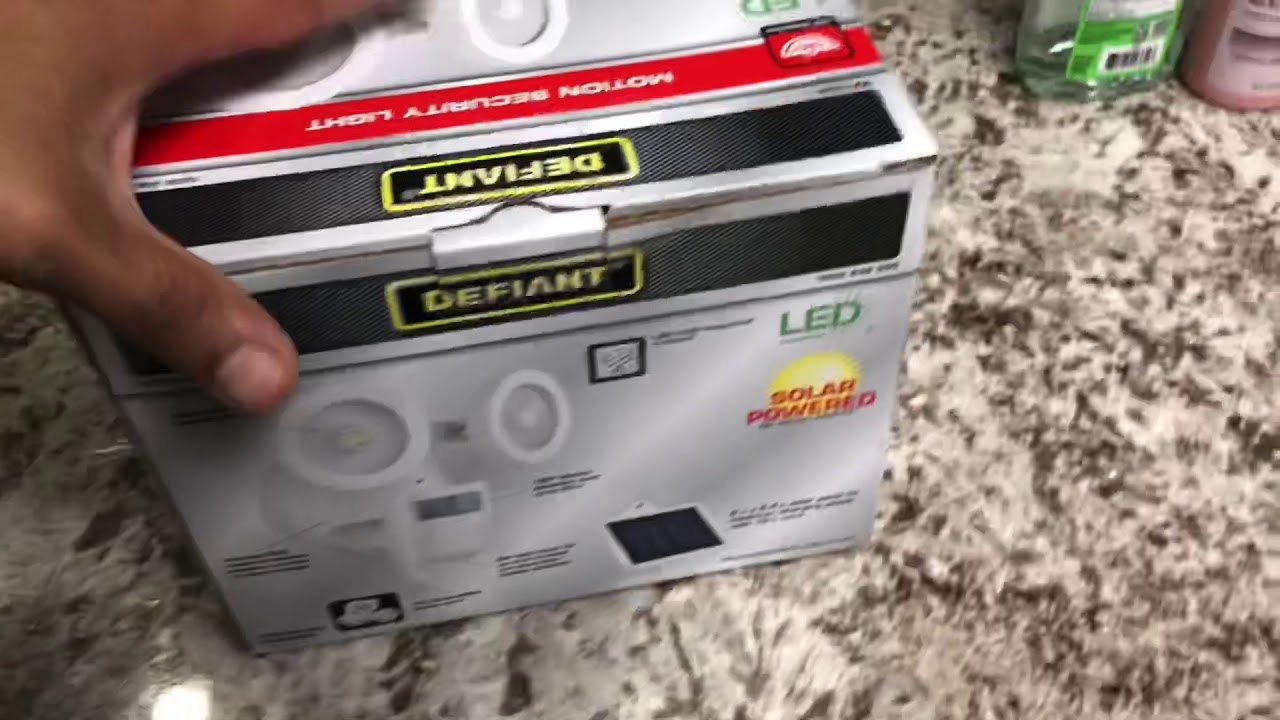 Defiant solar powered motion security light - YouTube