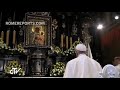 Pope praying to black madonna and child