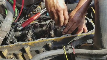 Replacing injector cups on Cat 3126E truck.