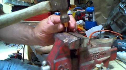 Making your own flint knapping tools. How to dome a copper cap.