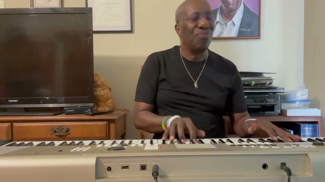 Jamming by Bob Marley ànd piano interpretation by John Arnold .Tobago Son.