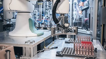 Semiautomatic Valve Assembly with Dual-Arm Cobots at Danfoss