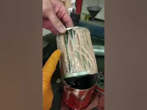 Gelled up diesel fuel filter from school bus - YouTube