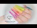 Rainbow nails with gel encapsulated neon glitter pigment. Ombre glitter gel nails. Nails