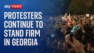 Georgia: Tens of thousands protest into the night