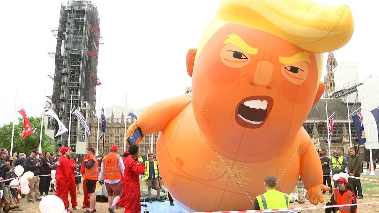 Live: Donald Trump baby blimp inflated ahead of protests | ITV News