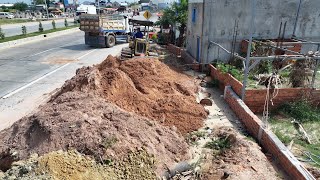 New project has just started pouring soil from the side of the road to people's houses