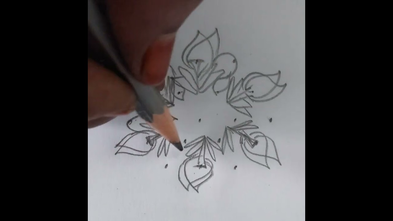 simple flower 🌺 rangoli design.