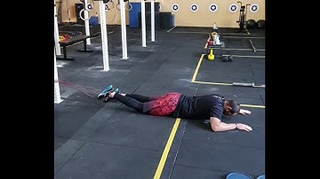 Flexão de joelho deitado unilateral com band