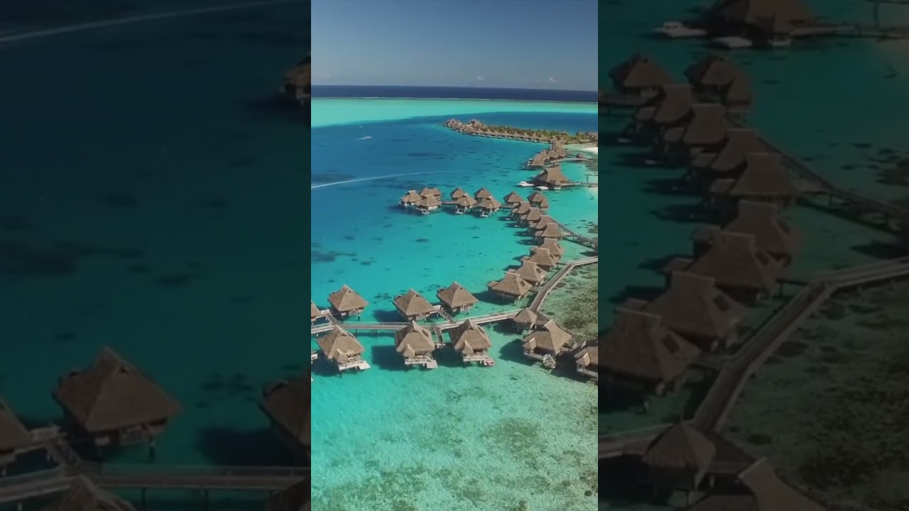 Swimming in the amazing blue water at Conrad Bora Bora Nui