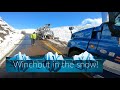 Winching out a big rig in the snow