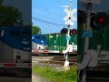 Fast Amtrak train meets fast CSX freight train.