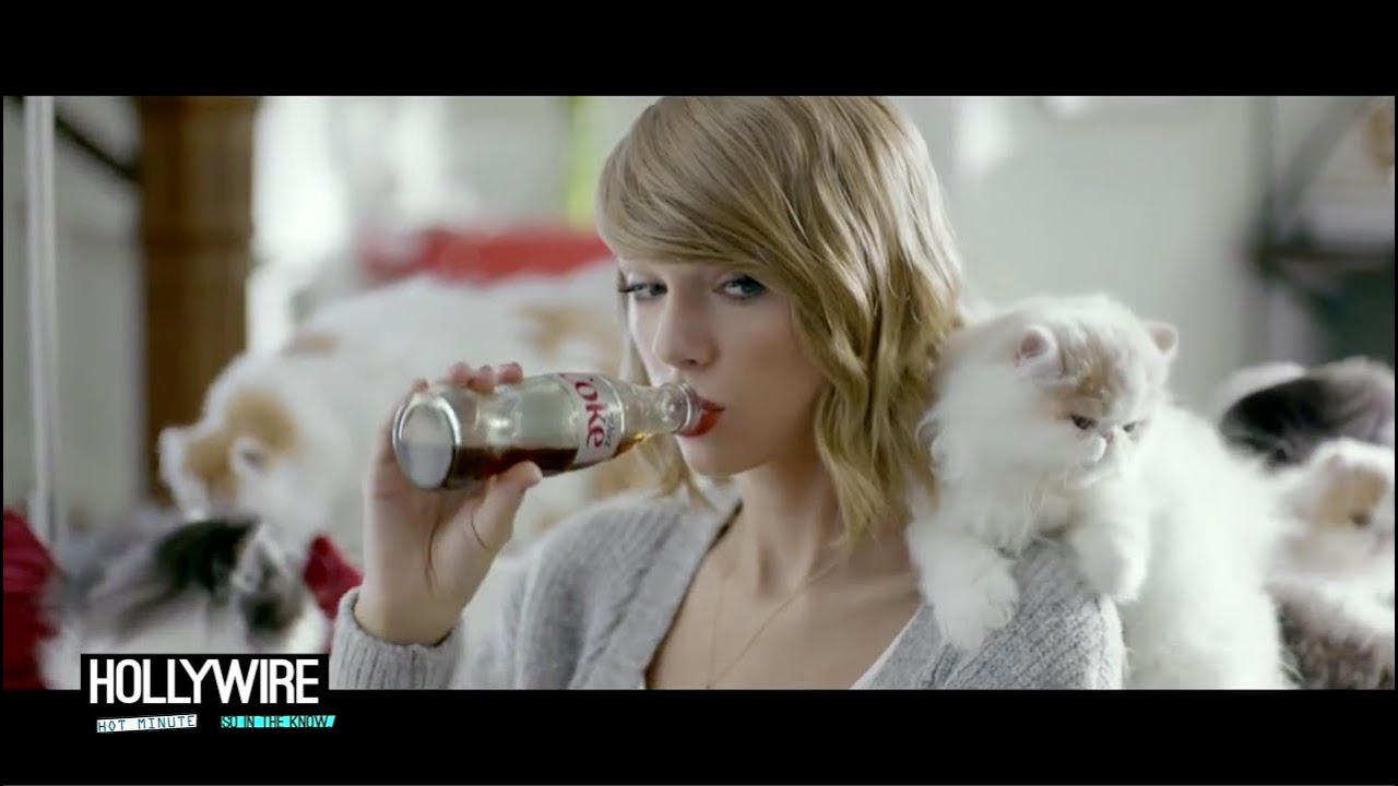 Ролик тейлор. Тейлор Свифт и Мередит. Кошка Тейлор Свифт. Taylor Swift Coca Cola. Реклама колы с Тейлор Свифт.