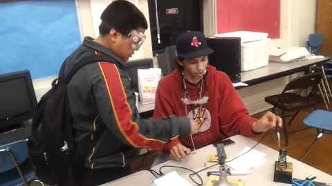 PORPOISE Robotics students soldering a Sparkfun Arduino PTH kit ... and finding it fun!
