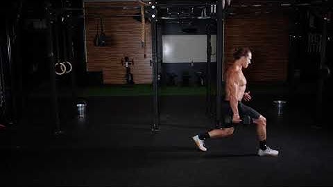 Single Arm Dumbbell Suitcase Walking Lunges