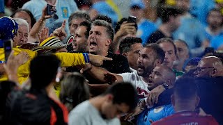 Uruguay players fight with Colombia fans after semifinal match at Copa America