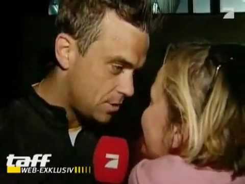 Video: Robbie Williams çok sevdiği köpeğiyle Rusya'ya gidiyor