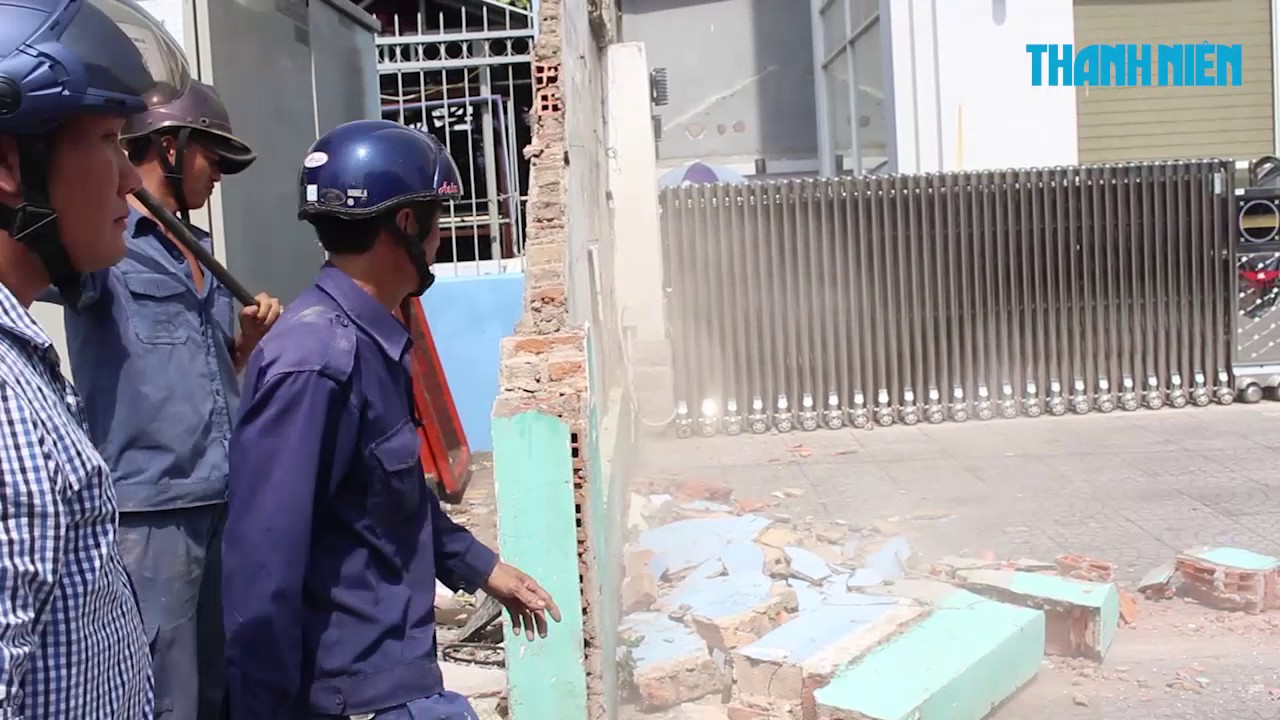 Phó chủ tịch Quận 1 dọn vỉa hè: Cẩu xe biển xanh, đập tường của Bộ Công thương