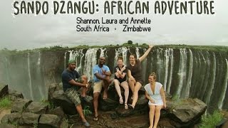 African Adventures - Sando Dzangu - Shannon and Friends
Shannon, Laura and Annette visit South Africa and Zimbabwe. This is their story.
They visit South Africa and Zimbabwe seeing landmarks such as Victoria Falls, Cape Town, town center of Johannesburg, city of Harare, crocodile feeding center, zip lines and many more beautiful African exhibits. Winter of 2014/2015. African Adventures - Sando Dzangu - Shannon and Friends
