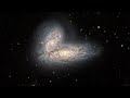 See merging galaxies closeup in stunning gemini north telescope 4k zoomin