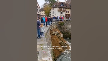 Riverbank Suddenly Collapses! Crowd & Wall Crash Into Stream! #shorts #short #shortsviral #disaster