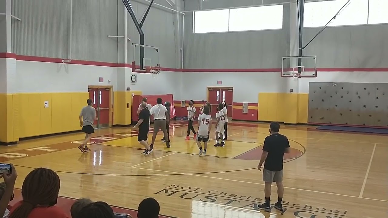 mot basketball- staff vs boys- Tommy shoots