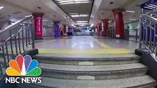 COVID-19 Fears Turn Beijing’s Busiest Streets Into A Ghost Town | NBC News
