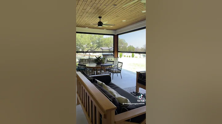 Motorized shades protecting this patio from the bugs and sun!