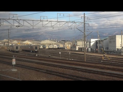 飯山線141D車窓より、廃車置場に解体される車両無い、長野総合車両センター。