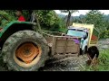 john deere pulling truck on hill || john Deere rescue