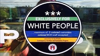 "Whites Only" Stickers Posted In Front Of Austin Businesses