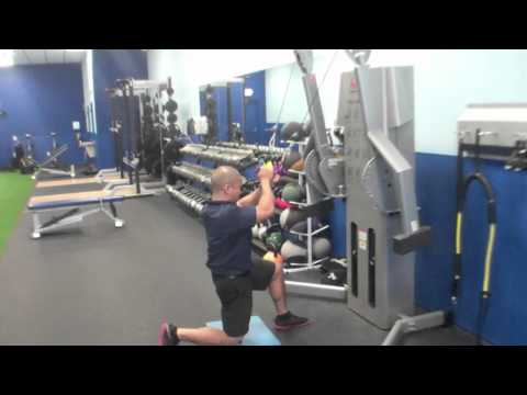 Half Kneeling High to Low X Cable Pulldown