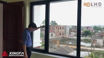 Cửa Sổ Mở Quay 2 Cánh 2 Bên Nhôm Xingfa Kết Hợp Vách Kính