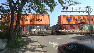 CPKC 112 intermodal stack train at Bartlett Ave.