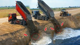 Be, Incredible Skills Dozer to push the soil into the lake with trucks worked together to dump soil