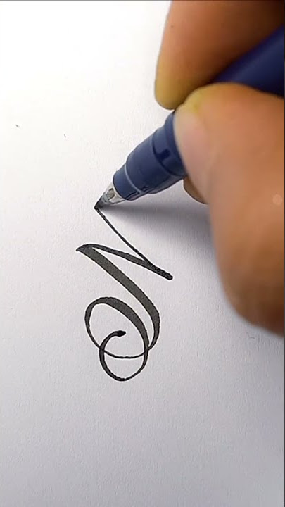 'M' calligraphy style.