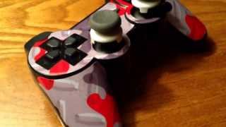 My PS3 controller with its new KontrolFreeks and a skin from 24/7 skins lol!